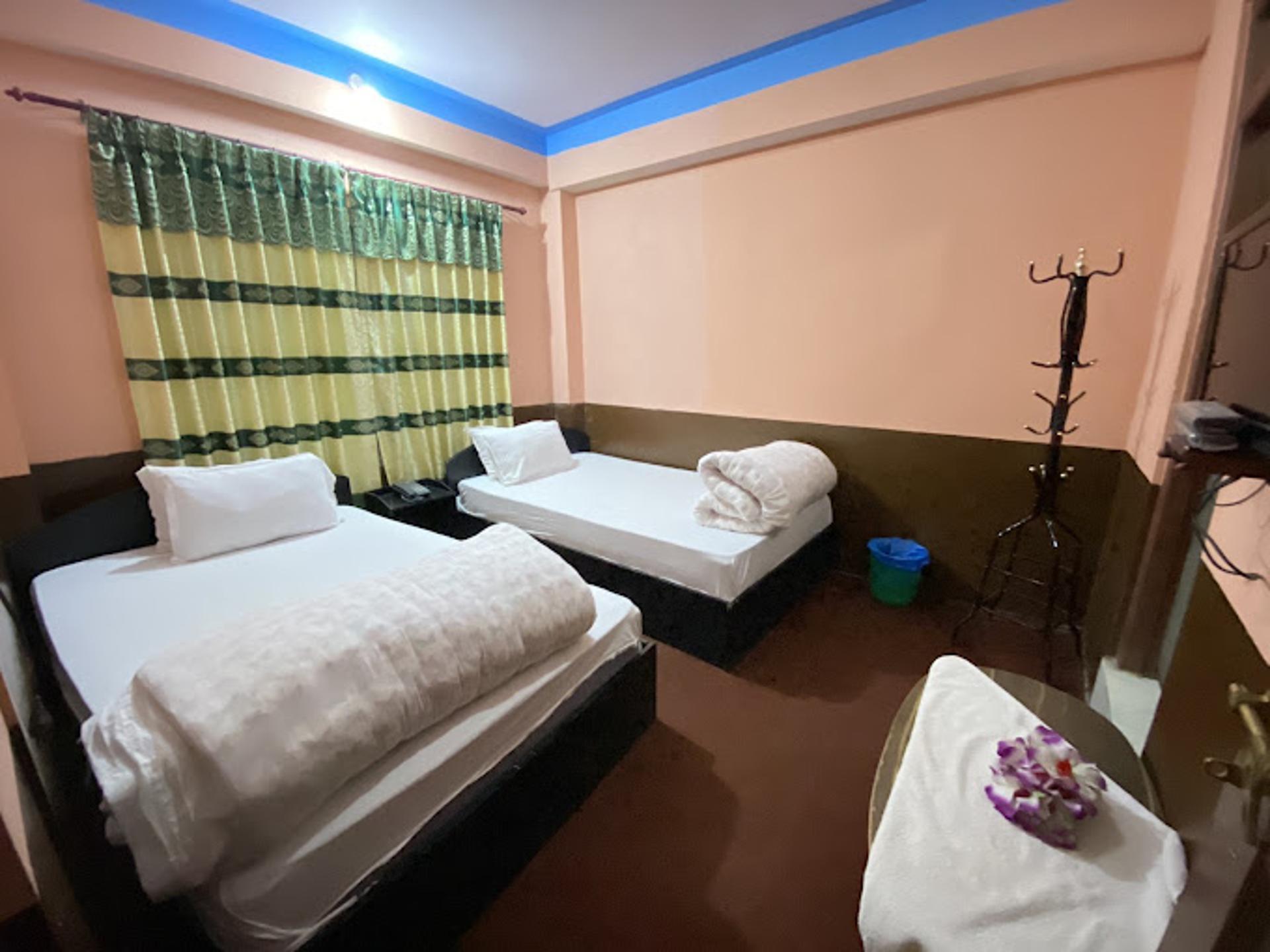 Normal Triple Room With Sharing Bathroom
