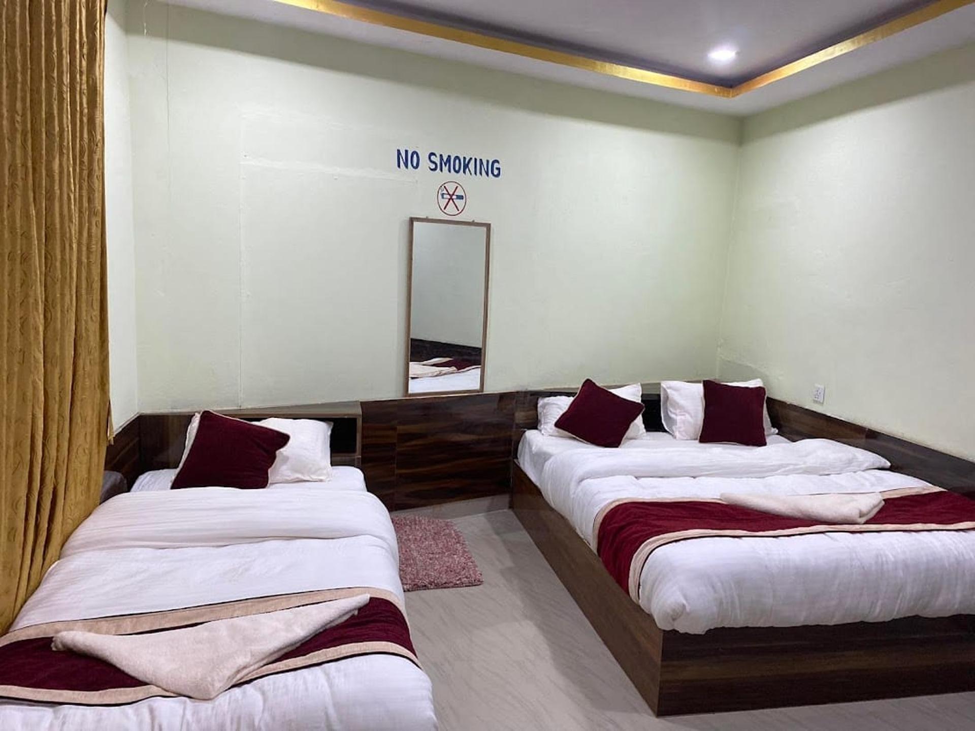 Deluxe Triple  Room