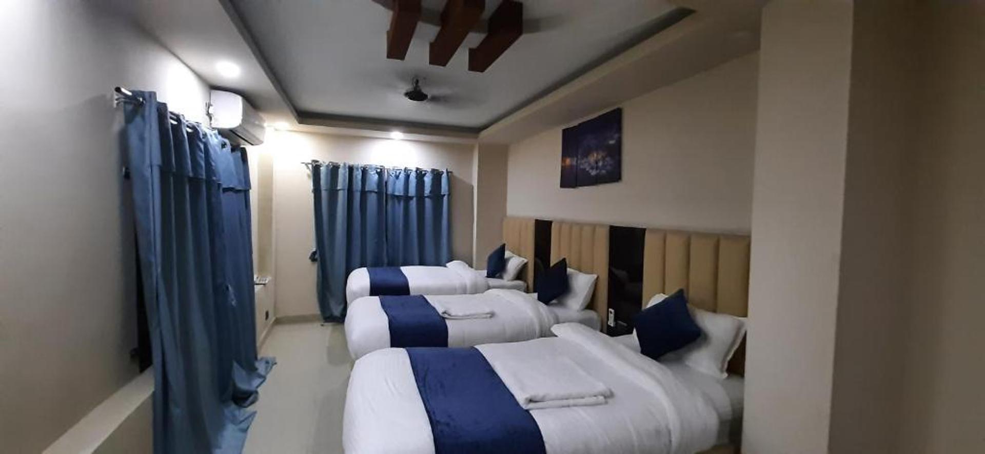 Deluxe Triple Room