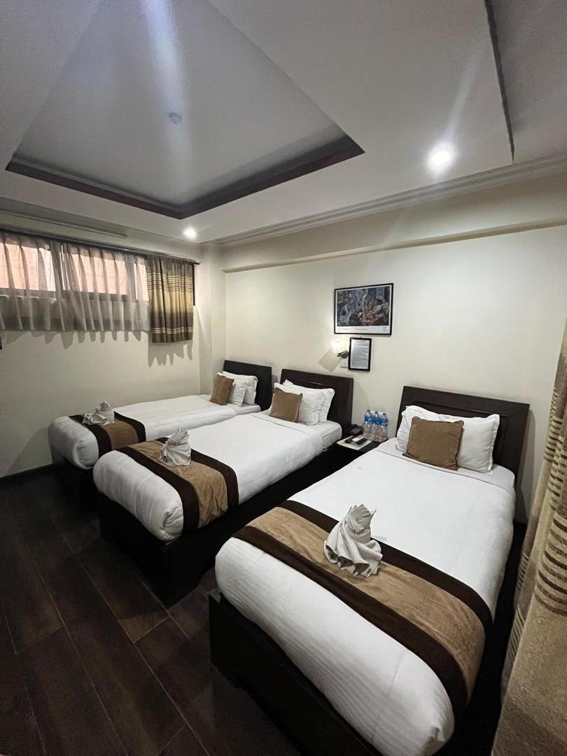 Deluxe triple Room