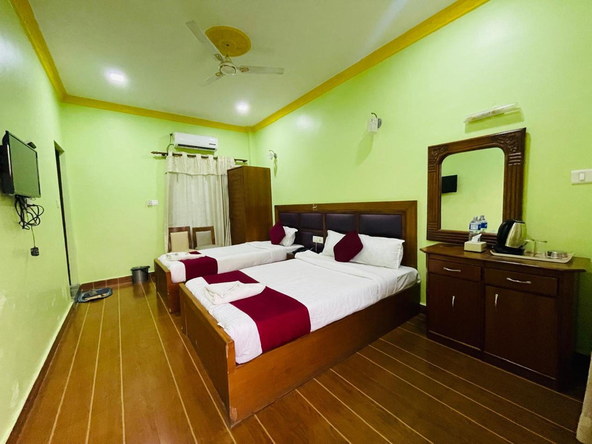 Deluxe Triple Bed Room