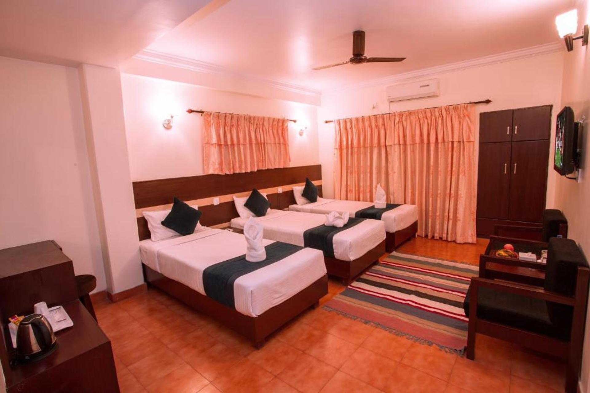Deluxe Triple Room