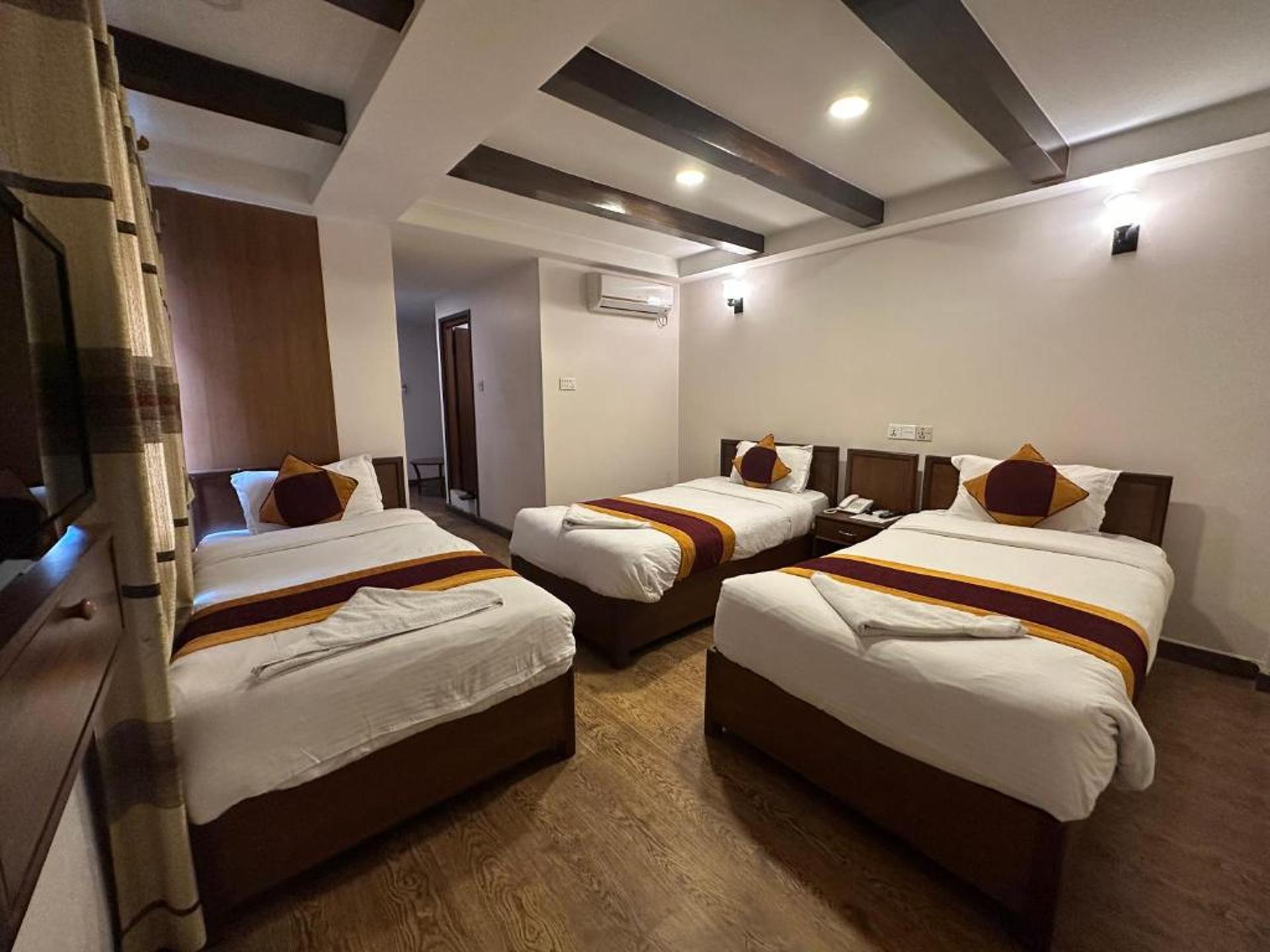 Deluxe Triple Room
