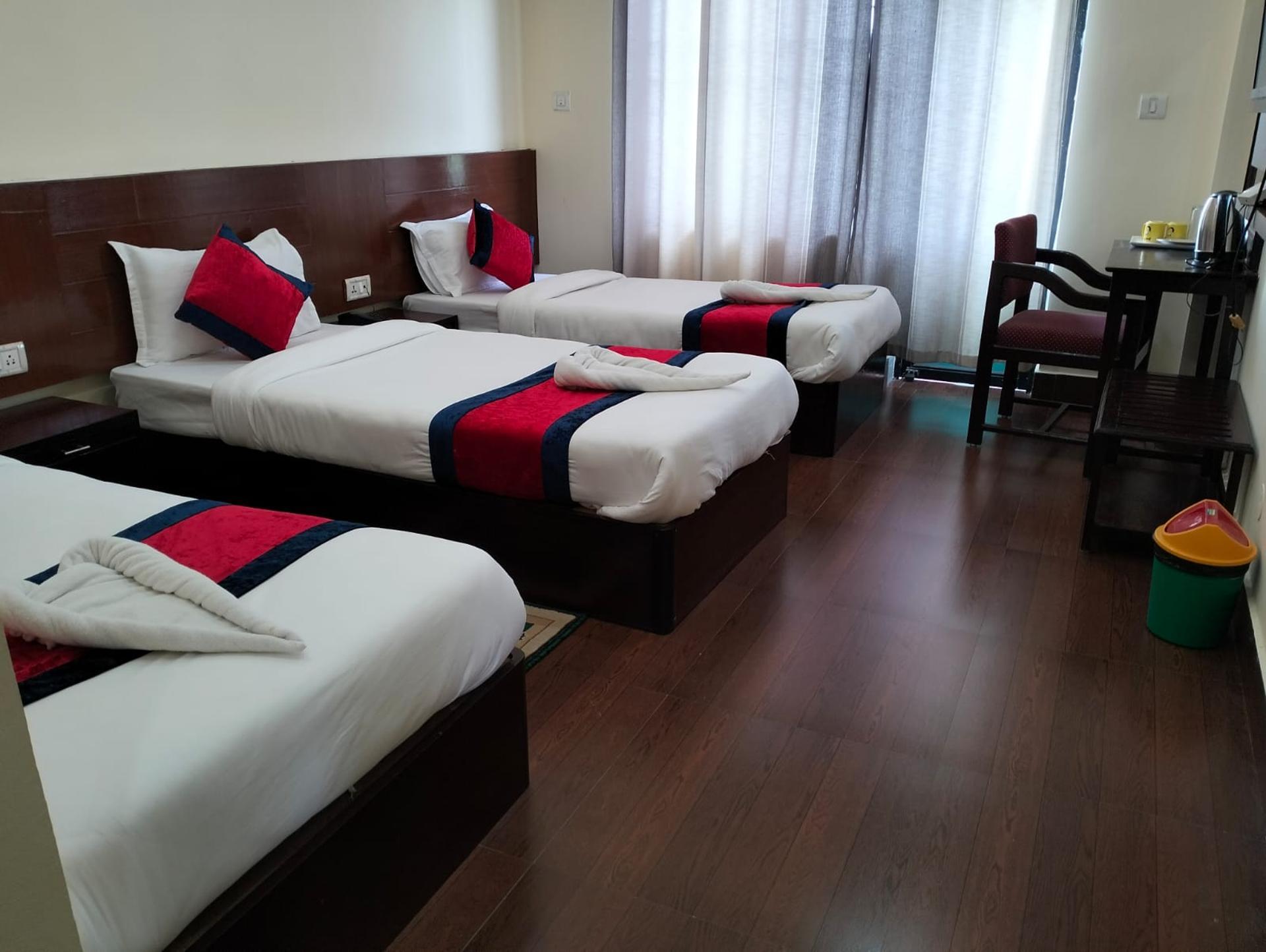 Deluxe Triple Bed Room