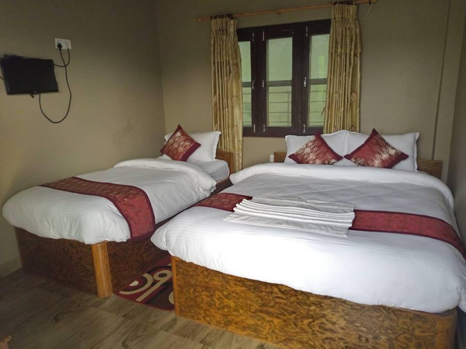 Triple Bed Room With King Size Bed