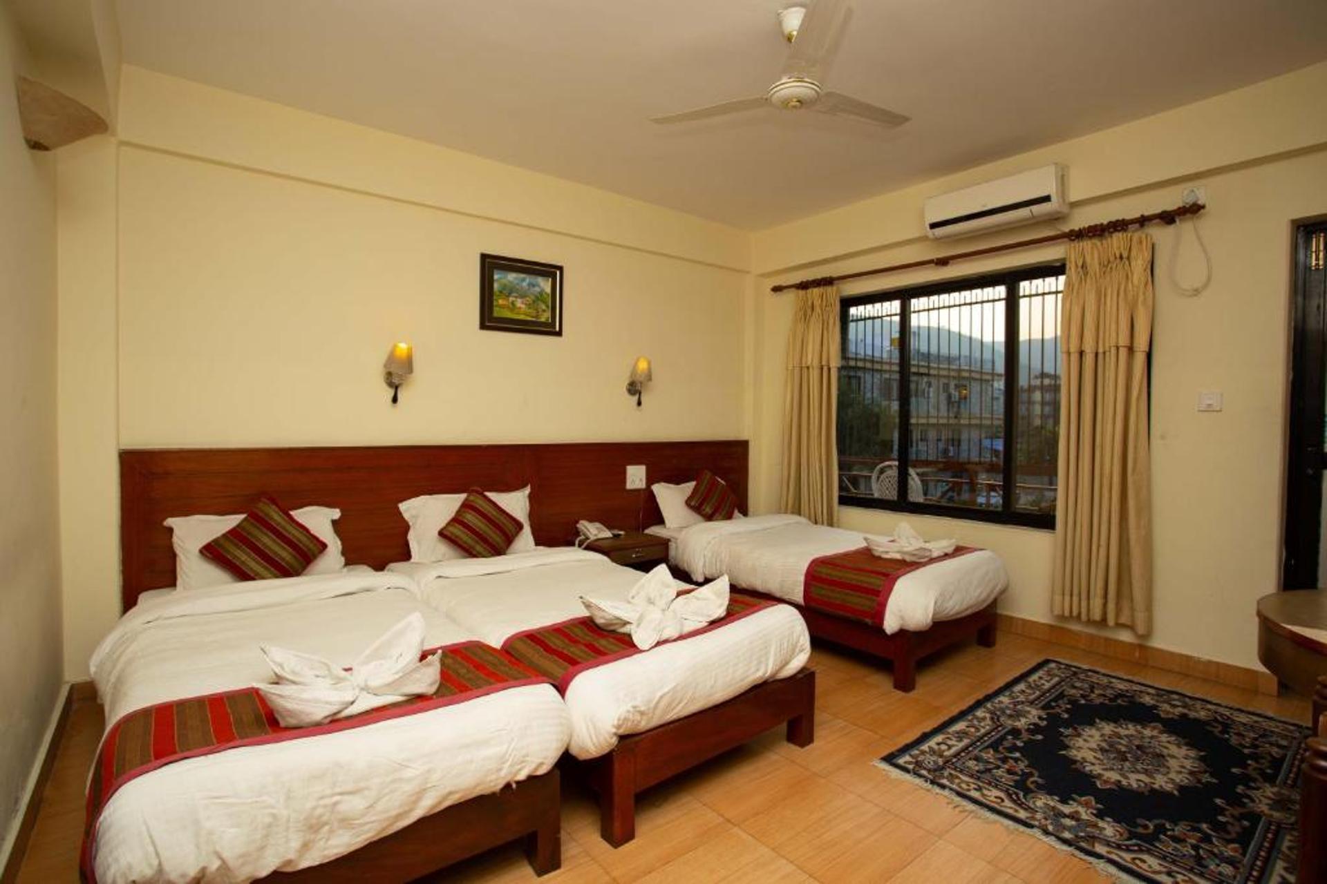 Deluxe Triple Room