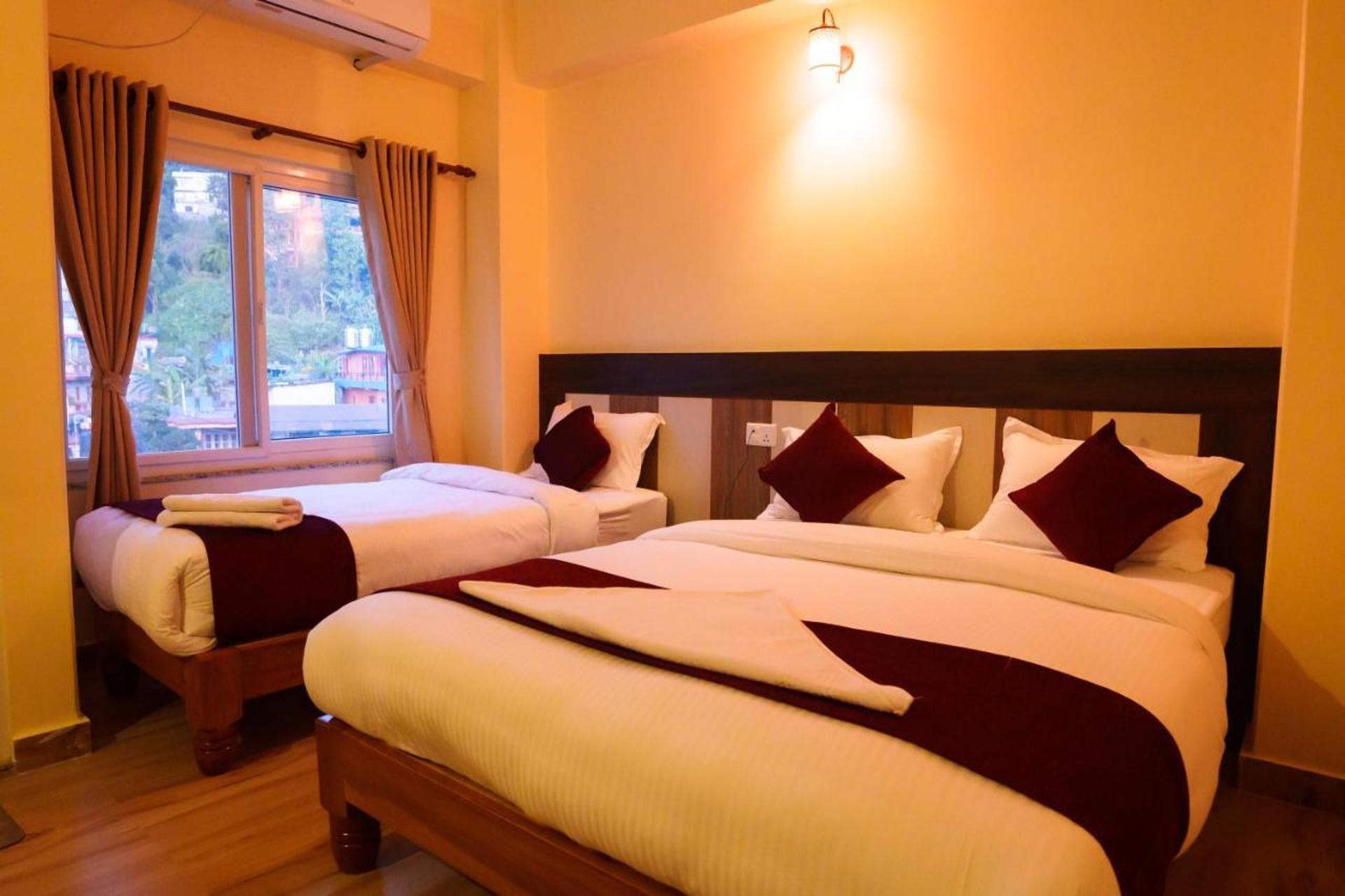 Deluxe Triple Room