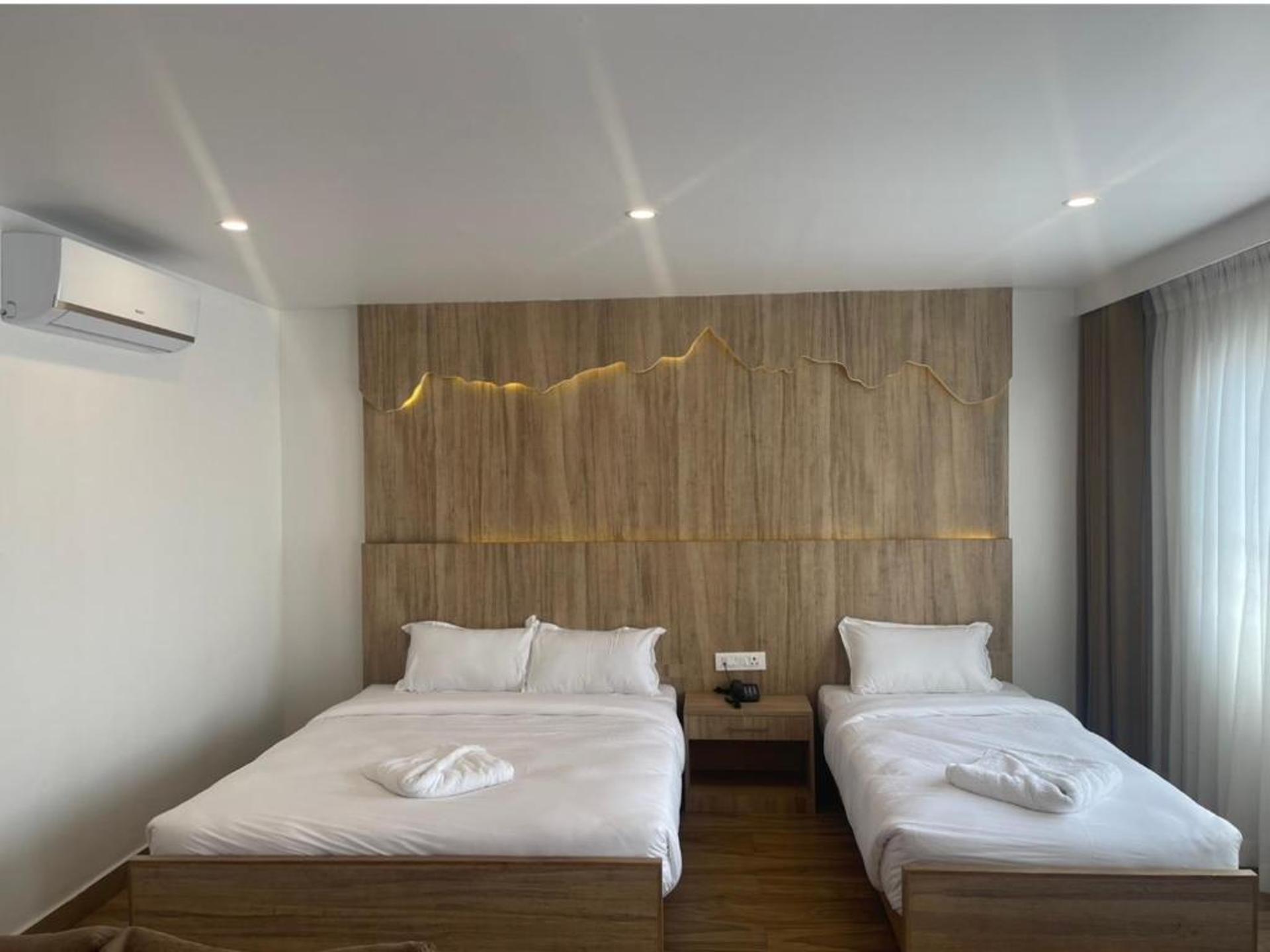 Deluxe Triple Room