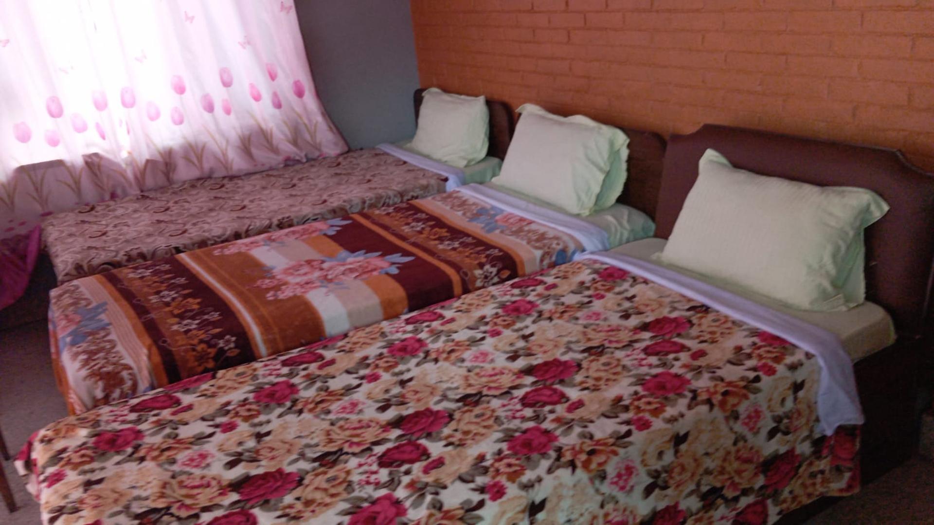 Triple Bedroom With Shared Bathroom