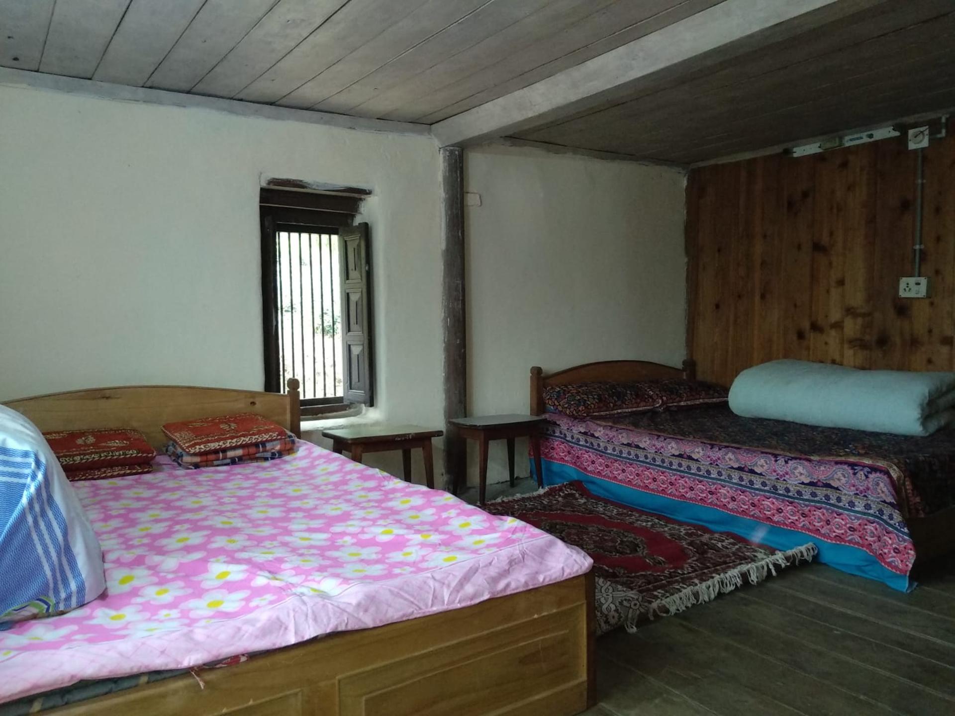 Quadruple Room with Sharing Bathroom