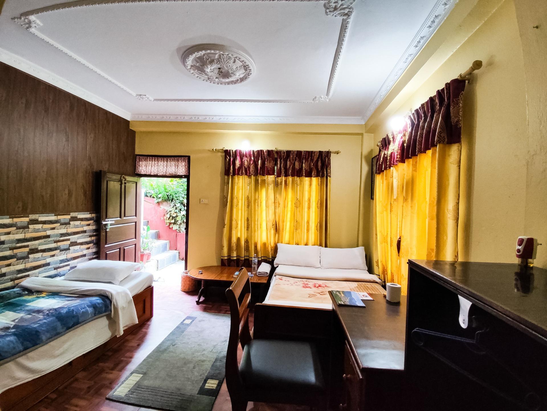 Deluxe Single & Double Bed Room