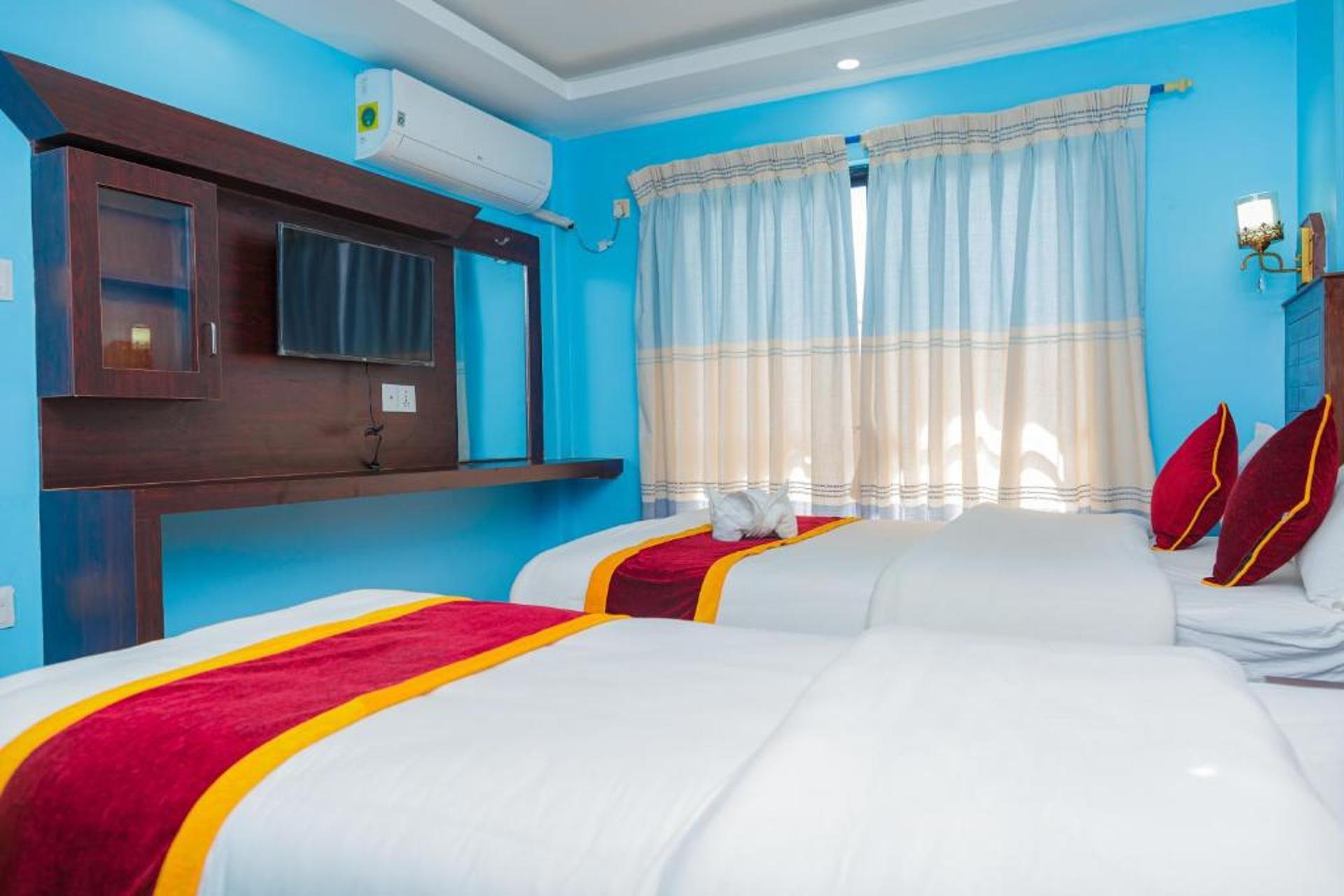 Deluxe Triple Room