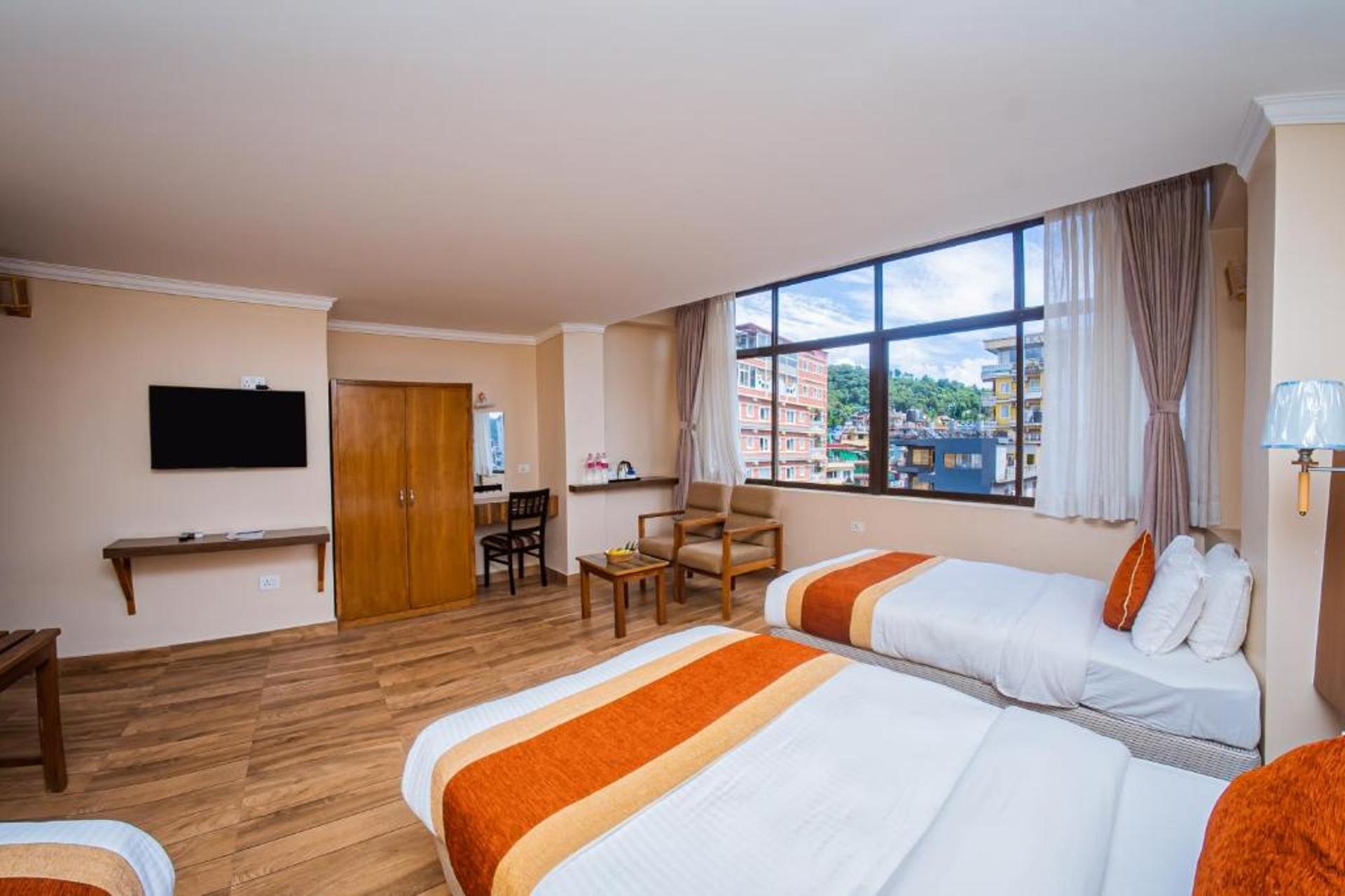Deluxe Family/Triple Room