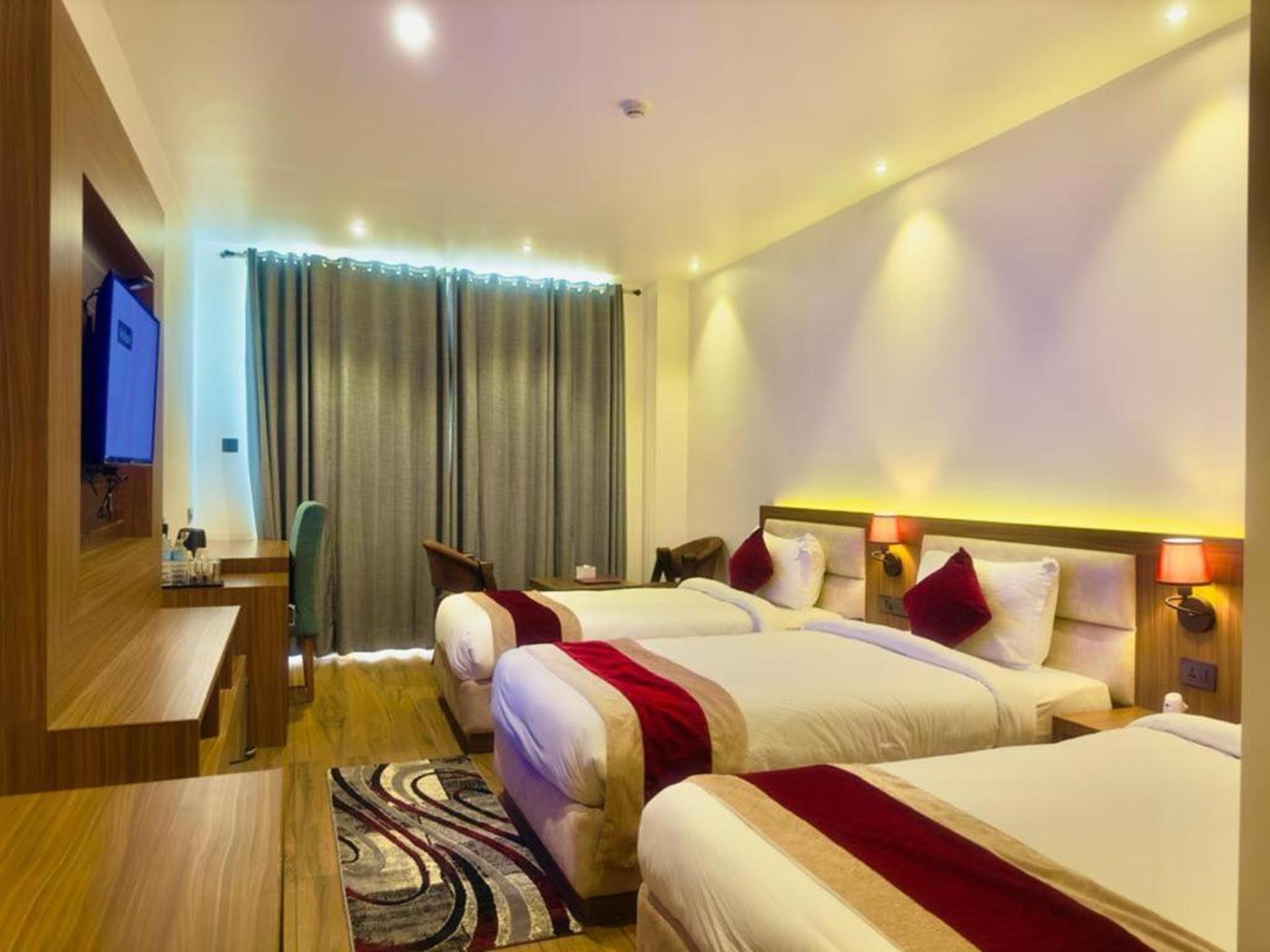 Deluxe Triple Room