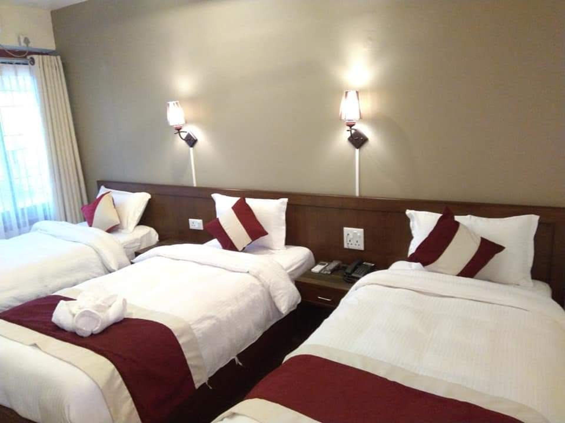 Deluxe Triple Room