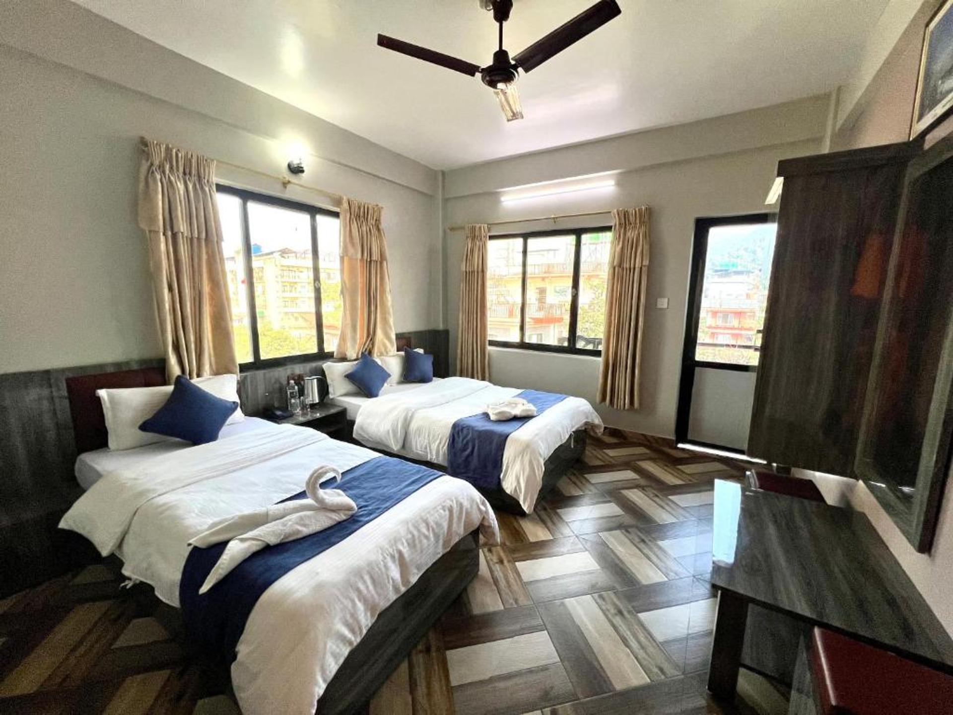 Deluxe Triple Room with Balcony
